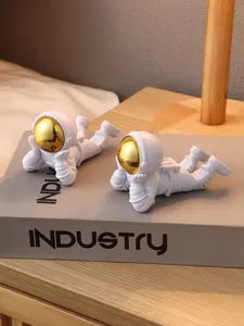 Support de téléphone astronaute créatif et jolie figurine décorative pour salon à la maison.