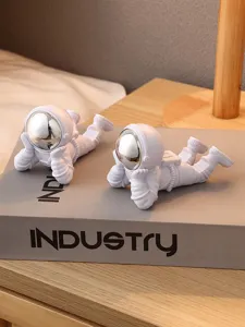 Support de téléphone astronaute détail, figurine décorative en résine créative pour bureau et salon.