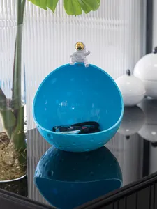 Blauwe maan astronaut sleutel opbergkom thuisdecoratie hal tafel detailweergave