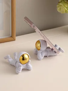 Support de téléphone astronaute détail, support de bureau en résine créatif pour le bureau.