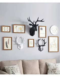 Nordisch hertshoofd muurbevestiging scènedetail, creatieve hars dierensculctuur voor wanddecoratie.