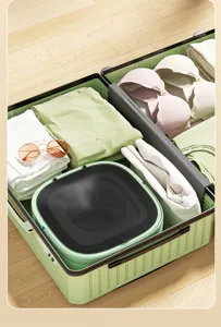 Detail view of the portable foldable mini washing machine neatly placed in a home storage box.