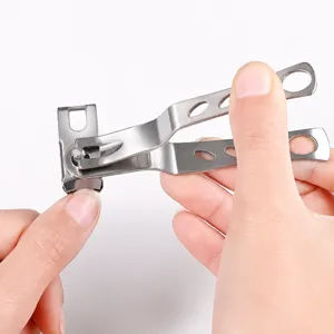 Stainless steel nail clipper with ergonomic cutout handles for precise nail trimming and care.