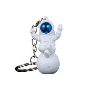 Creative astronaut keychain with moon pendant, metal ring for student gifts and birthday.