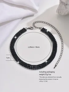 Detailed view of the sparkling black rhinestone choker necklace with adjustable metal chain.