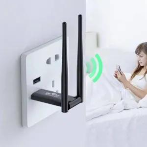 Wireless WiFi signal repeater detail view showcasing dual antennas plugged in bedroom scene.