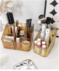 Amber transparent cosmetic storage box desktop makeup organizer with multi-compartments for brushes.
