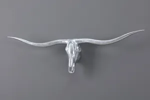 Silver longhorn bull skull wall hanging rustic animal head sculpture for home decor.