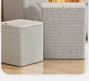 Grote visgraat stoffen kleding opbergdoos met deken en rits voor thuisorganisatie in slaapkamer.