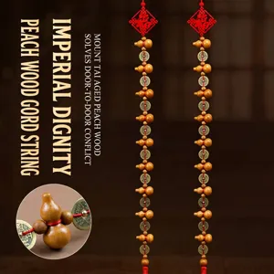 Traditional handcrafted peach wood gourd ornament with copper Five Emperor coins for home decor