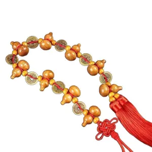 Traditional Feng Shui hanging ornament with peach wood gourds and Five Emperors copper coins.