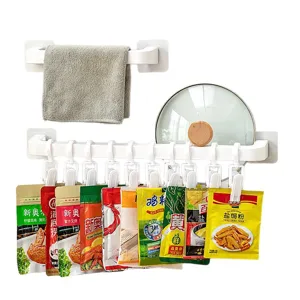 Support suspendu multifonction en plastique blanc avec pinces pour cuisine et salle de bain.