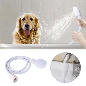 Detail view of multifunctional handheld shower head and hose for pet bathing and hair washing.