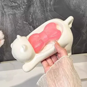 Cute cat shaped soap dish with drainage design, ceramic bathroom soap holder, pink bow decor.
