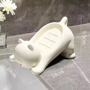 Cute ceramic cat soap dish with drainage design, perfect for bathroom sink countertop use.