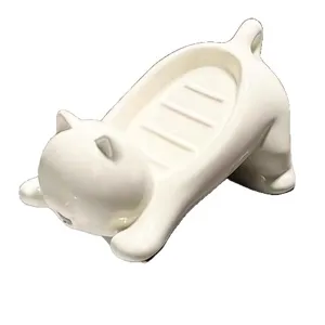 Cute cat ceramic soap dish with drainage design for bathroom washbasin storage organizer.