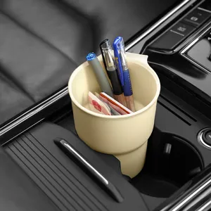 Car cup holder multi-functional organizer for vehicle center console storage and beverage bottle stand.