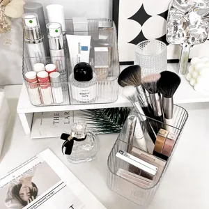 Clear makeup organizer desktop cosmetic storage box for lipstick brushes skincare vanity setup.
