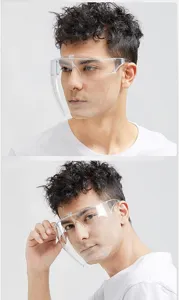 Detailed view of clear protective face shield worn by model for anti-spatter protection.
