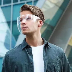Clear transparent protective face shield anti-fog safety mask for eye and face protection.