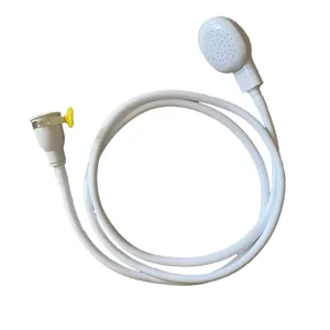 Portable white plastic handheld shower head with long flexible hose and faucet clamp