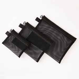 Set di tre bustine per cosmetici con cerniera in rete nera, custodie per trucco portatili.