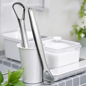 Nettoyeur de langue manuel en acier inoxydable pour haleine fraîche et hygiène bucco-dentaire.