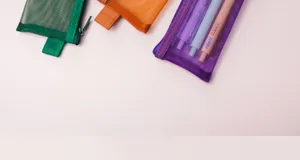 Detail view of simple transparent mesh pencil case, portable stationery storage bag.