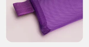 Close-up detail of purple mesh pouch fabric, showing fine texture and strong edge stitching.