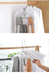 Multi-functional wave clothes hanger for scarves, ties, straps, and underwear storage.
