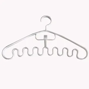 Multi-functional wave clothes hanger with swivel hook, perfect for dorm and home storage.