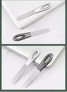 Stainless steel nail file detailed view, showing dual-sided metal nail buffer tool for manicure.