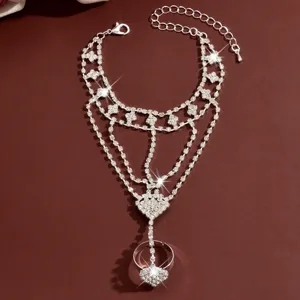 Gorgeous rhinestone heart hand chain slave bracelet for women, sparkling crystal fashion jewelry.