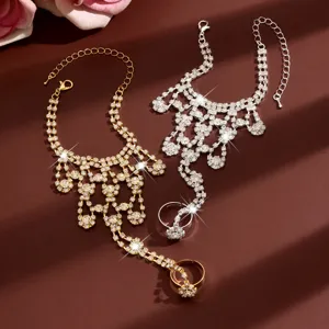 Exquisite crystal rhinestone slave bracelet detail, shimmering luxury hand chain for wedding party.