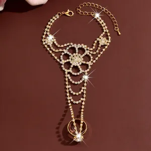 Exquisite rhinestone flower slave bracelet gold hand chain fashion jewelry for women.