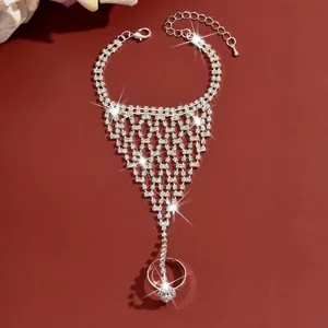Detailed view of fashionable rhinestone hand chain slave bracelet with delicate fringe design.