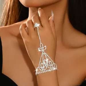 Exquisite rhinestone hand chain detailed view, elegant geometric design finger ring bracelet for women.