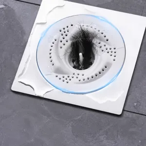 Japanese style vortex floor drain hair catcher bathroom anti-clogging filter strainer tool.