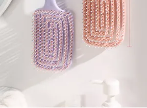 Large curved hair brush for fluffy styling, hollow skeleton comb with wide teeth for smooth hair.
