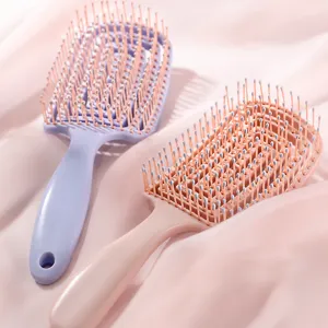 Curved hair brush for smooth styling, hollow massage comb with flexible teeth, dry and wet use.