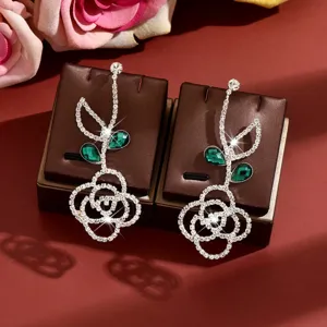 Elegant rhinestone rose long dangle earrings with green crystal leaves for women fashion.
