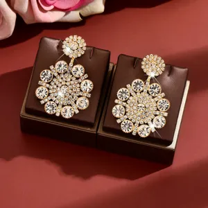 Sparkling crystal rhinestone flower dangle earrings with luxury design for party.
