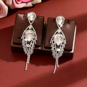 Stunning long crystal tassel earrings with sparkling teardrop rhinestones for women parties.