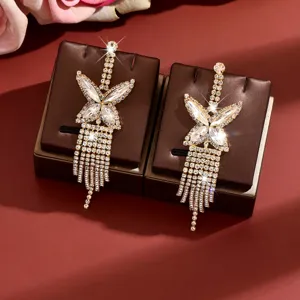 Elegant crystal butterfly tassel earrings sparkling rhinestone jewelry for women party wear.