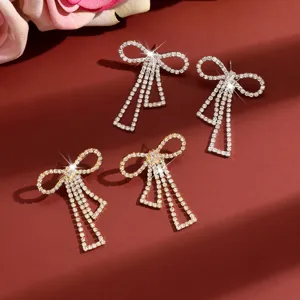 Elegant rhinestone bow tassel earrings for women, sparkling crystal chic jewelry gift.