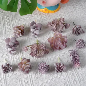 Collection of various artificial purple flocked succulent plants for home DIY decoration.