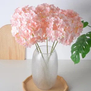 Flores artificiales de hortensia rosa en jarrón de vidrio para bodas y decoración.