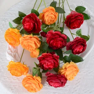 Bouquet de fleurs de pivoines artificielles en rouge et orange vue de dessus pour déco