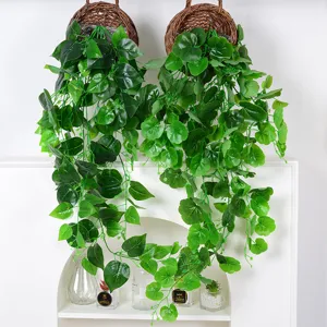 Realistic artificial hanging pothos and ivy vines in wicker baskets for home wall decor