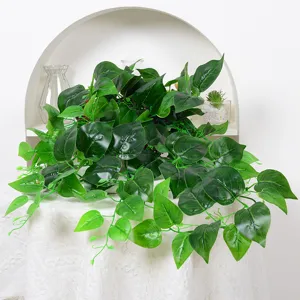 Lush artificial hanging pothos ivy vine with glossy green leaves for home wall decor